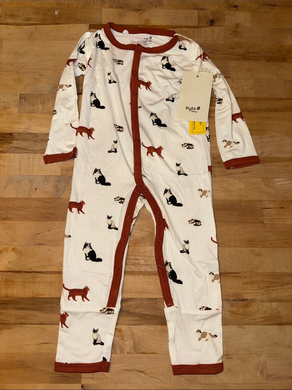 Kyte BABY Cream One-Piece with Rust Trim & Cat Print